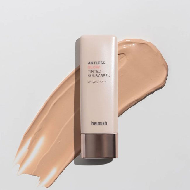Heimish Artless Glow Tinted Sunscreen Shine Beige SPF50+ PA+++ 40ml Heimish Artless Glow Tinted Sunscreen Shine Beige SPF50+ PA+++ combines powerful sun protection with a radiant, natural finish. This lightweight tinted sunscreen evens skin tone, hydrates, and delivers a healthy glow, making it perfect for daily use on all skin types.