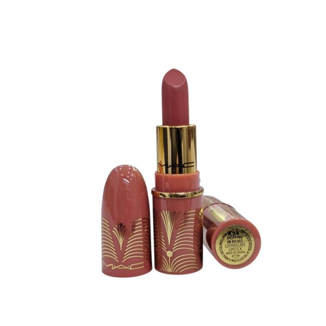 Dripping In Riches MAC Mini Lustreglass Sheer-Shine Lipstick 1.5G (Without Packet From Set ) 123 MAC Lustreglass Sheer-Shine Lipstick is sheer perfection. Experience glamour with a revamped sheer, and shiny formula. It delivers translucent, glossy color with nourishing ingredients. Enjoy buildable color, a long-wearing, lustrous finish, and smoother lips. Its silky texture glides effortlessly. •Long-wearing color, 8 hours •Long-wearing shine, 6 hours •Lightweight, buildable lipstick coverage •Comfortable formula •Weightless feel •Size 0.05 oz / 1.5 g •Made in Canada •Color : Dripping In Riches : Sheer Peachy Light Nude (MAC Golden Girls Mini Lustre Glass Lipstick Vault Gift Set, Full Size , without packet)